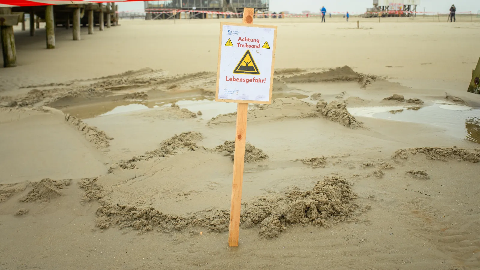 woman swallowed by quicksand beach